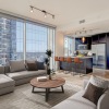 spacious living room and kitchen with views of downtown Austin at Northshore