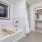 Bathroom with soaking tub and walk-in closet in Austin