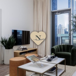 a living room with a heart graphic 